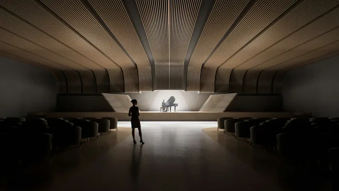 Spreker alleen op het podium van een verduisterd auditorium.
